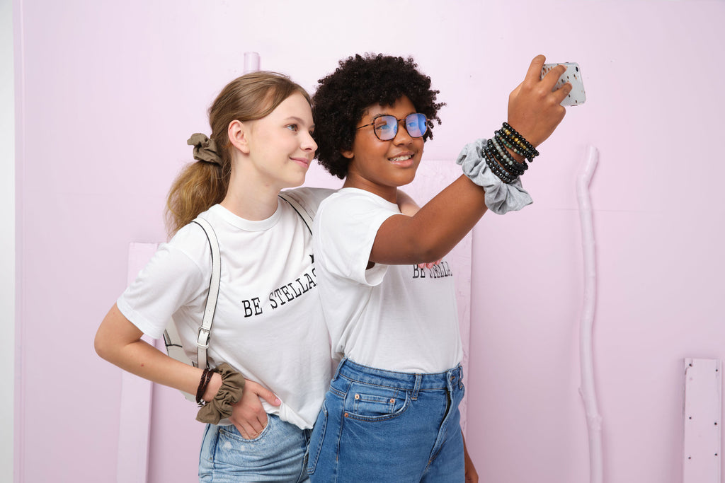 Two Stellar teens taking a selfie